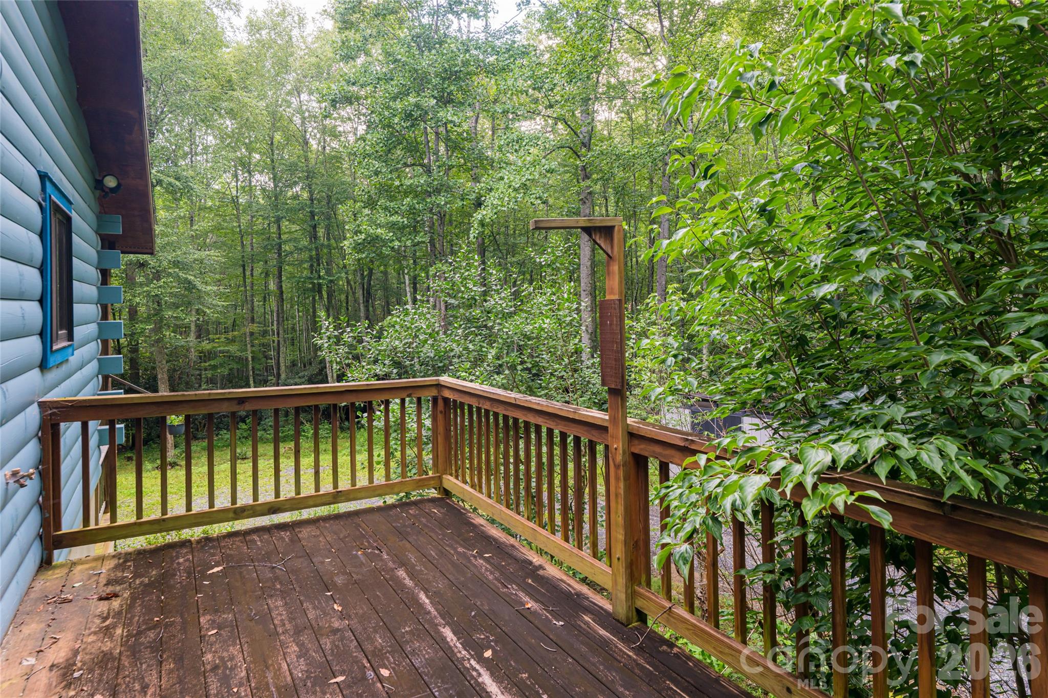 4035 Bald Creek Road Clyde, NC 28721 - Photo 31 of 43 a view of a balcony with wooden floor