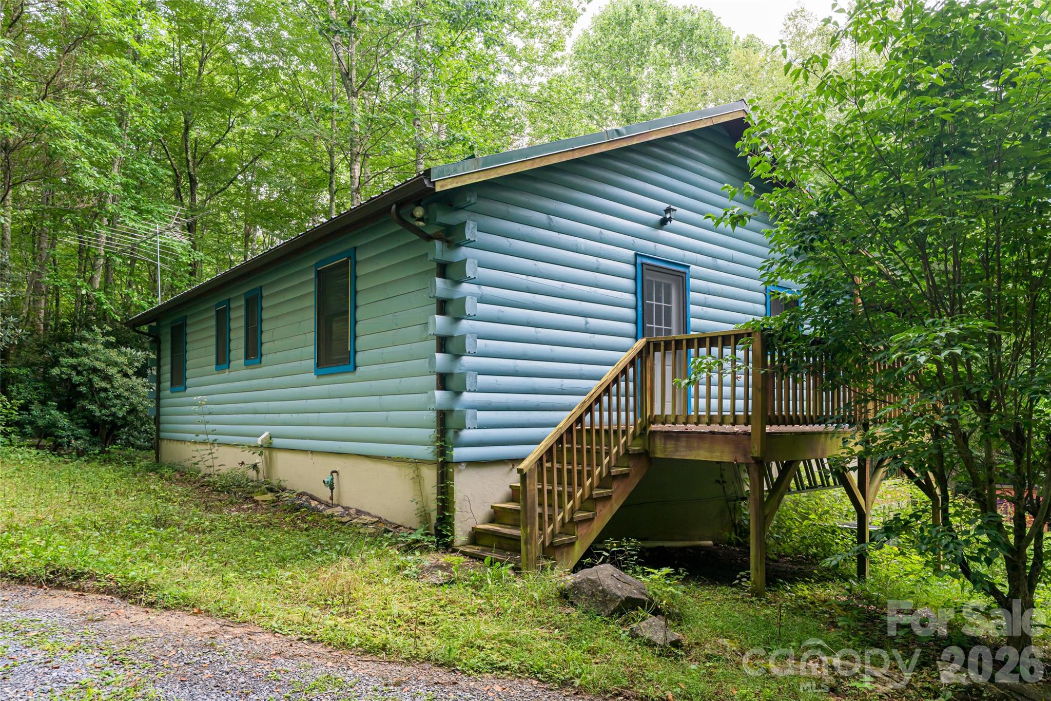 4035 Bald Creek Road Clyde, NC 28721 - Photo 32 of 43 a front view of a house with garden