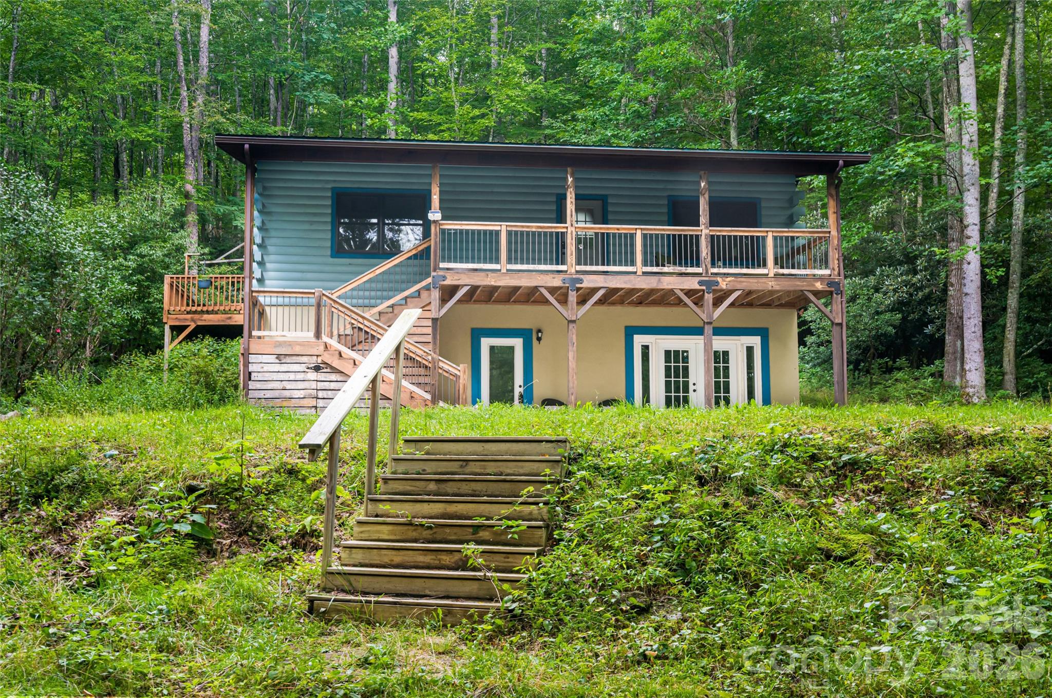 4035 Bald Creek Road Clyde, NC 28721 - Photo 43 of 43 a front view of a house with a yard