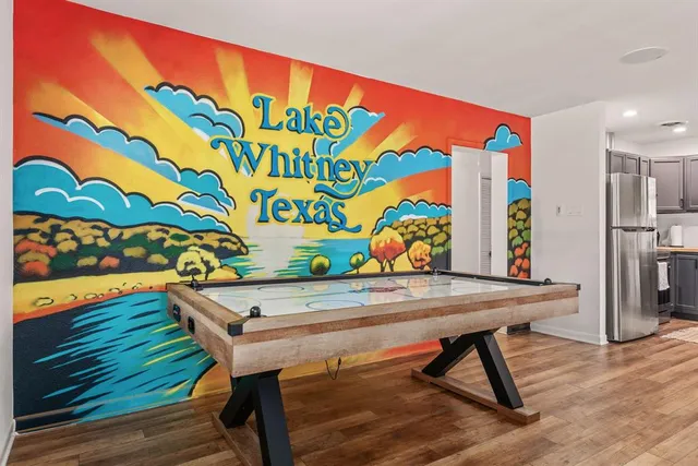 a room with table and chairs