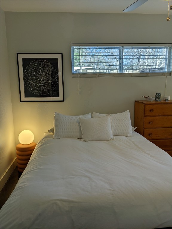 2206 East 9th Street, Unit B Austin, TX 78702 - Photo 12 of 15 a bedroom with a bed and window