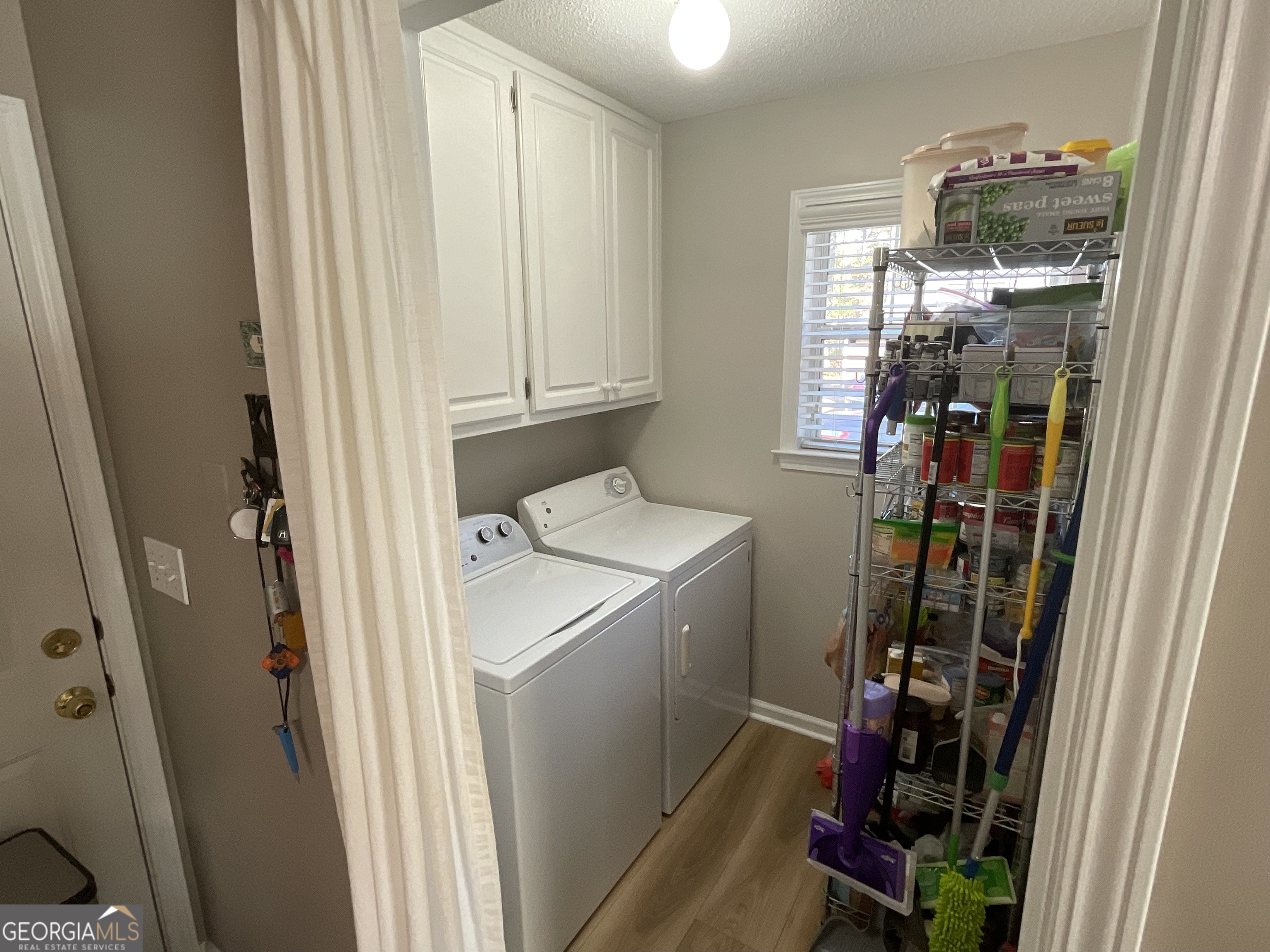 45 Riverside Walk Sharpsburg, GA 30277 - Photo 13 of 25 a room with storage and utility