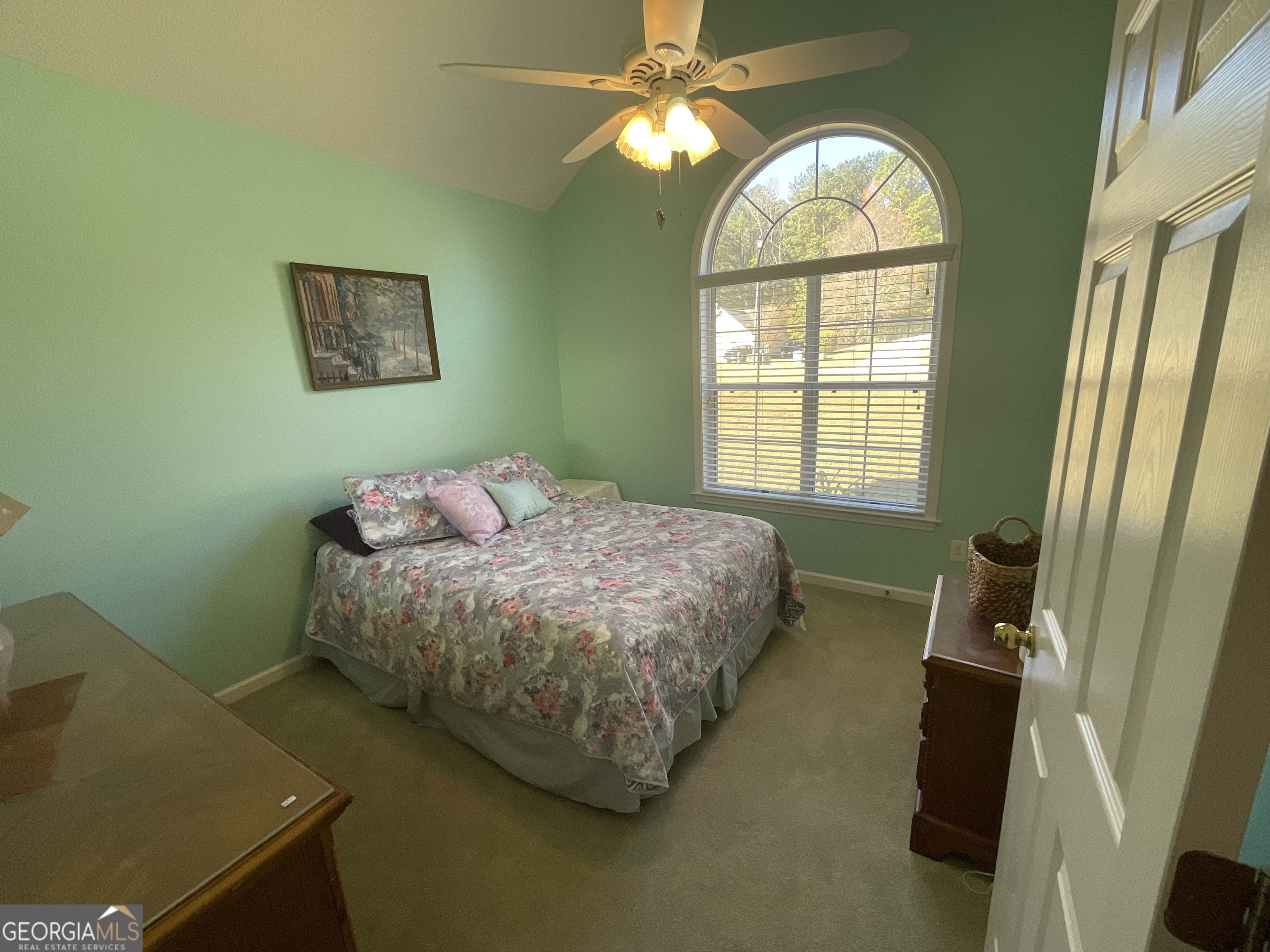 45 Riverside Walk Sharpsburg, GA 30277 - Photo 17 of 25 a bedroom with a bed and a window