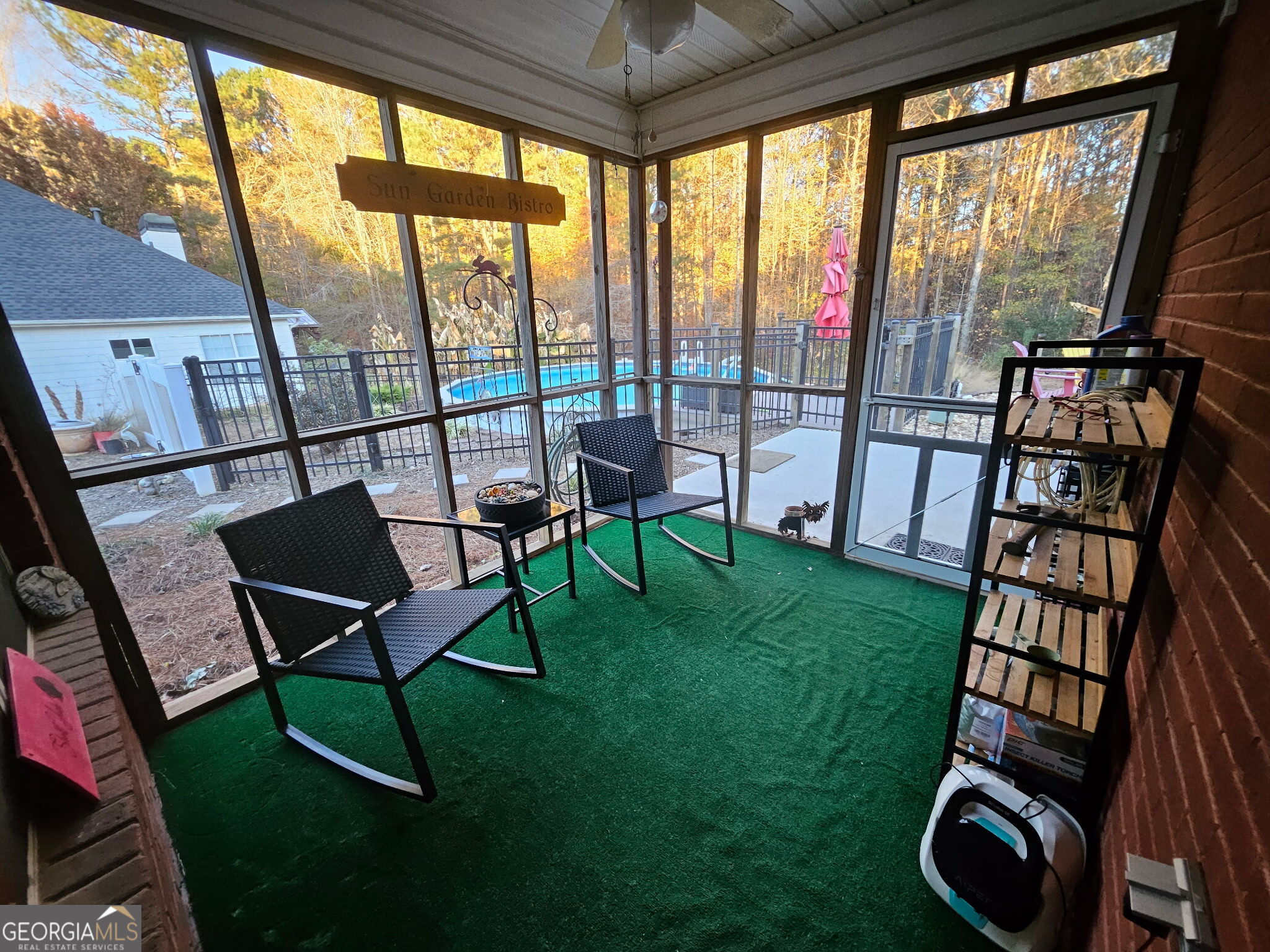 45 Riverside Walk Sharpsburg, GA 30277 - Photo 25 of 25 a view of a chairs in backyard of the house