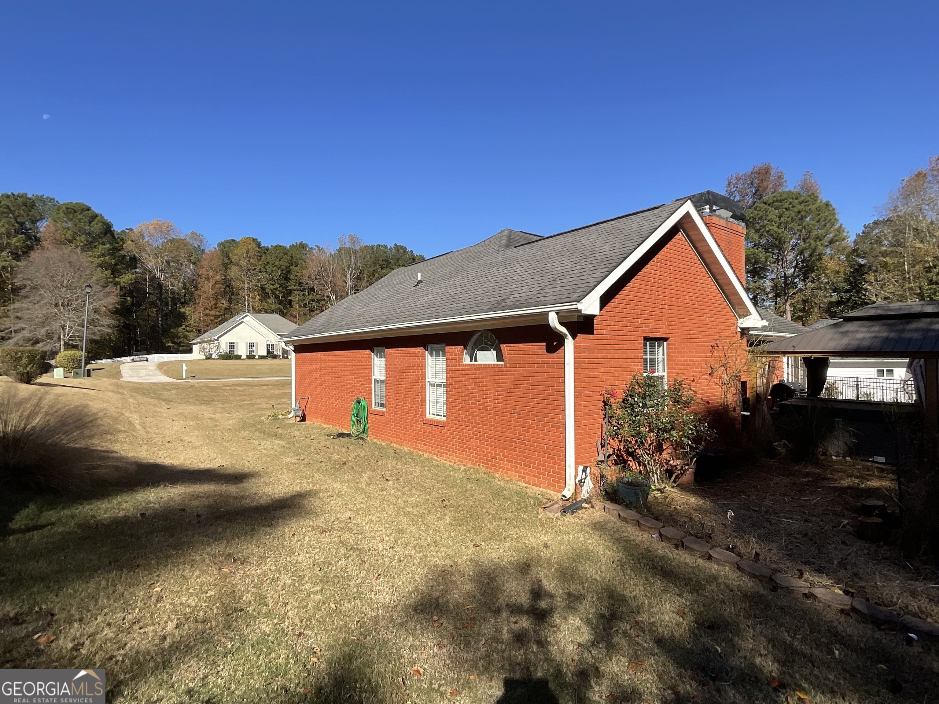 45 Riverside Walk Sharpsburg, GA 30277 - Photo 7 of 25 a view of a house with a yard