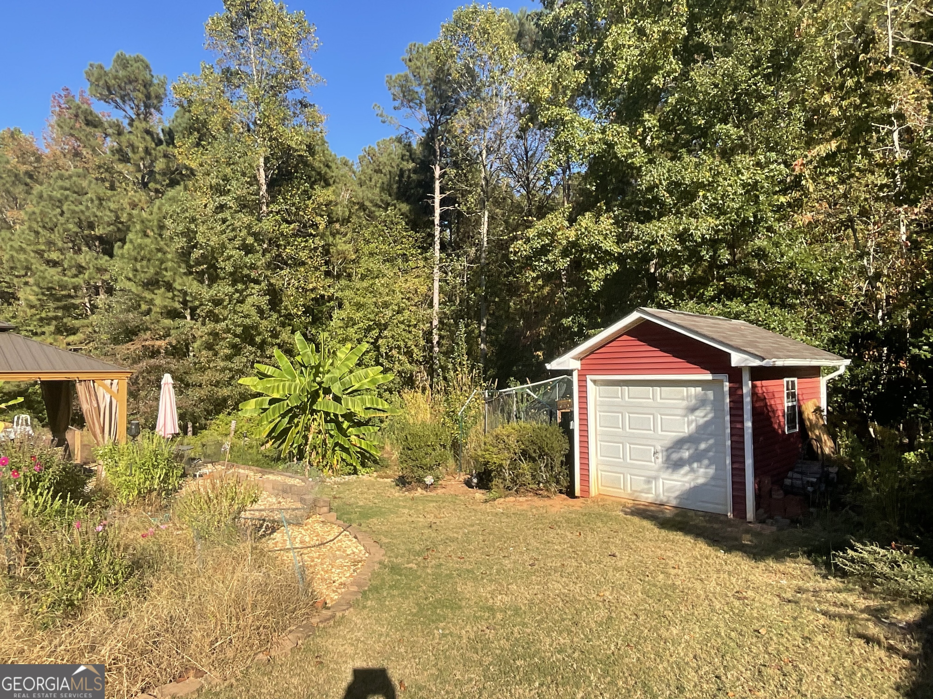 45 Riverside Walk Sharpsburg, GA 30277 - Photo 8 of 25 a view of a house with a yard