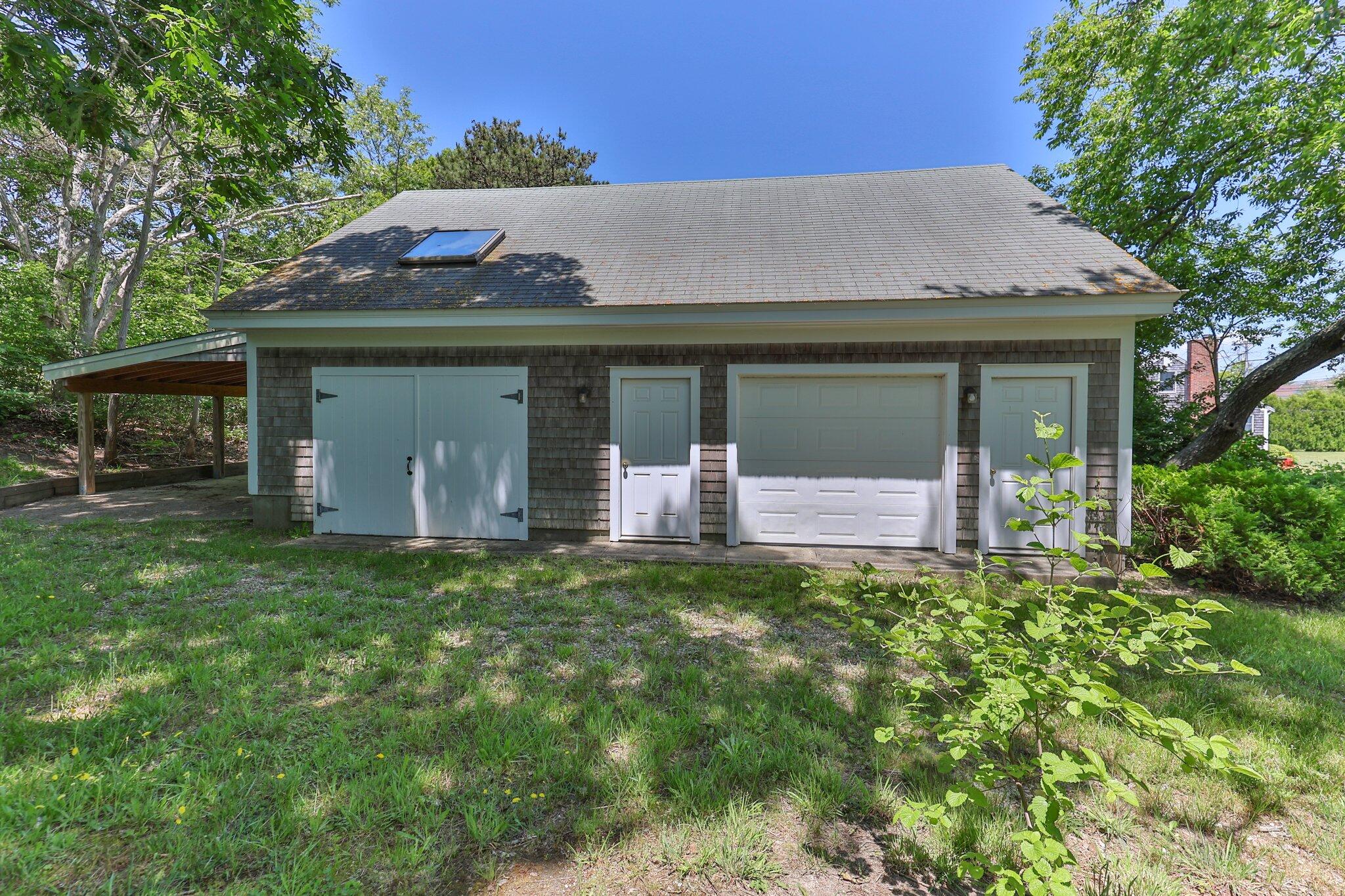 231 Crowell Road Chatham, MA 02633 - Photo 11 of 27 front view of a house with a yard
