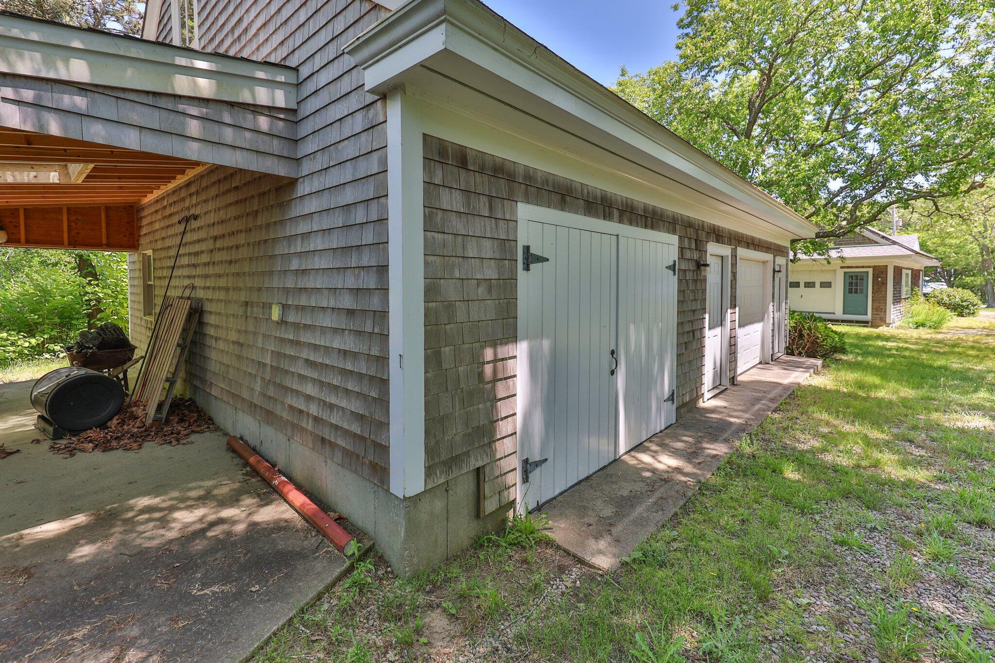 231 Crowell Road Chatham, MA 02633 - Photo 12 of 27 a view of a house with a yard