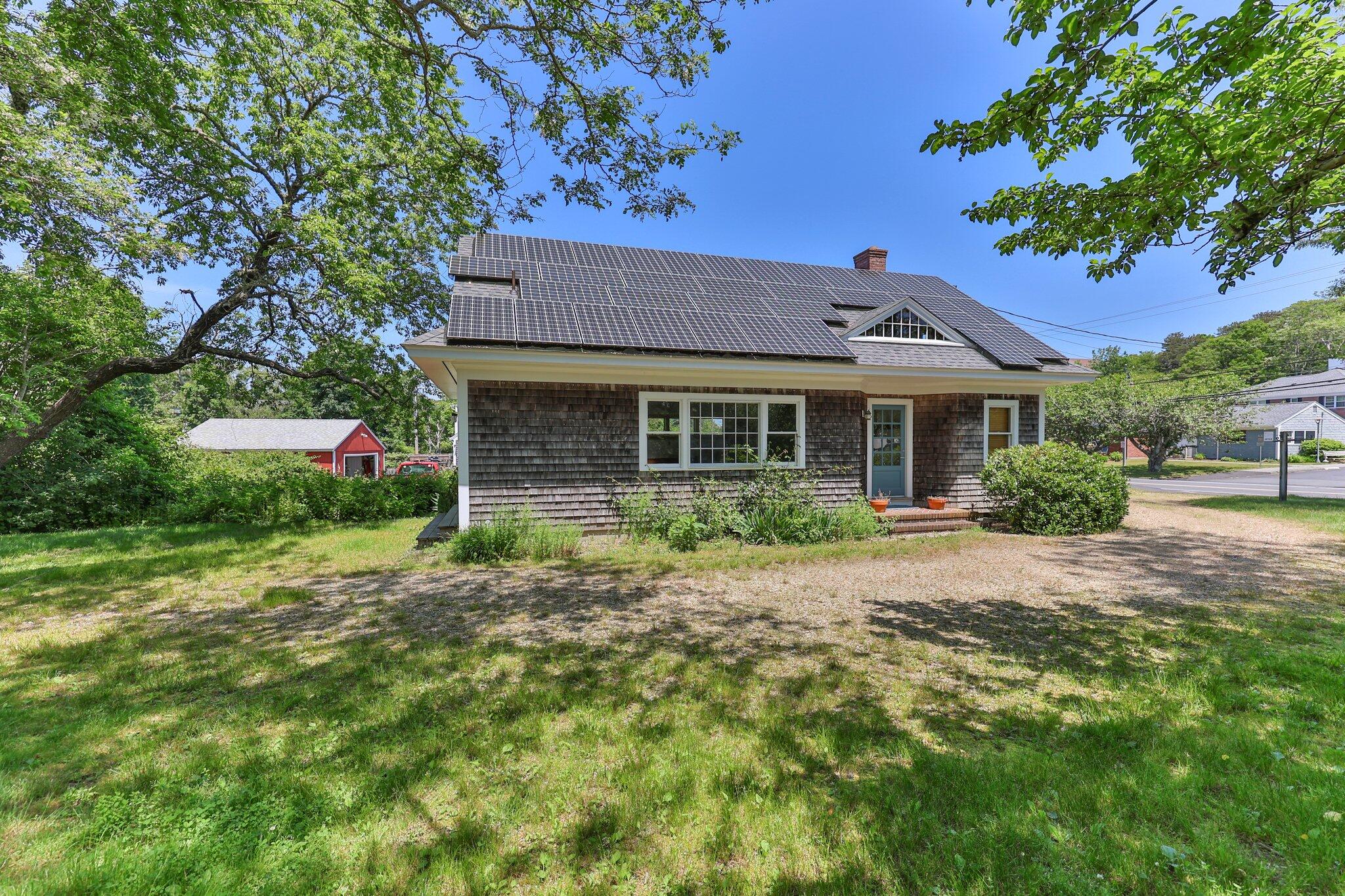 231 Crowell Road Chatham, MA 02633 - Photo 22 of 27 a front view of a house with a yard
