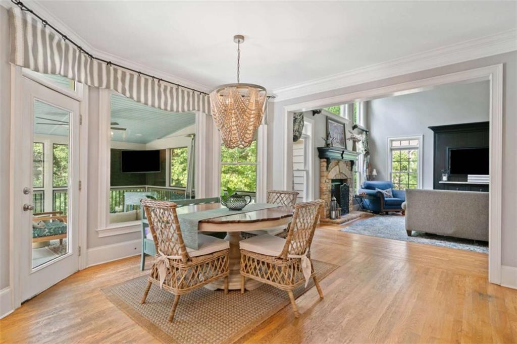 380 Creek Point Milton, GA 30004 - Photo 15 of 74 a view of a dining room with furniture window and wooden floor