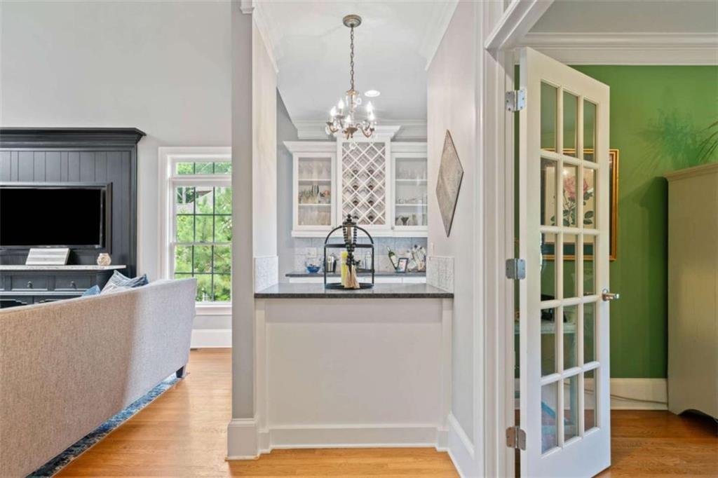 380 Creek Point Milton, GA 30004 - Photo 21 of 74 a living room with furniture and a flat screen tv