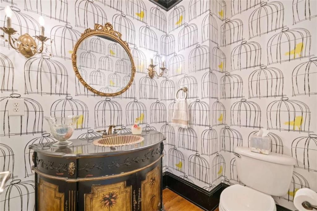 380 Creek Point Milton, GA 30004 - Photo 28 of 74 a bathroom with a sink a toilet and a mirror