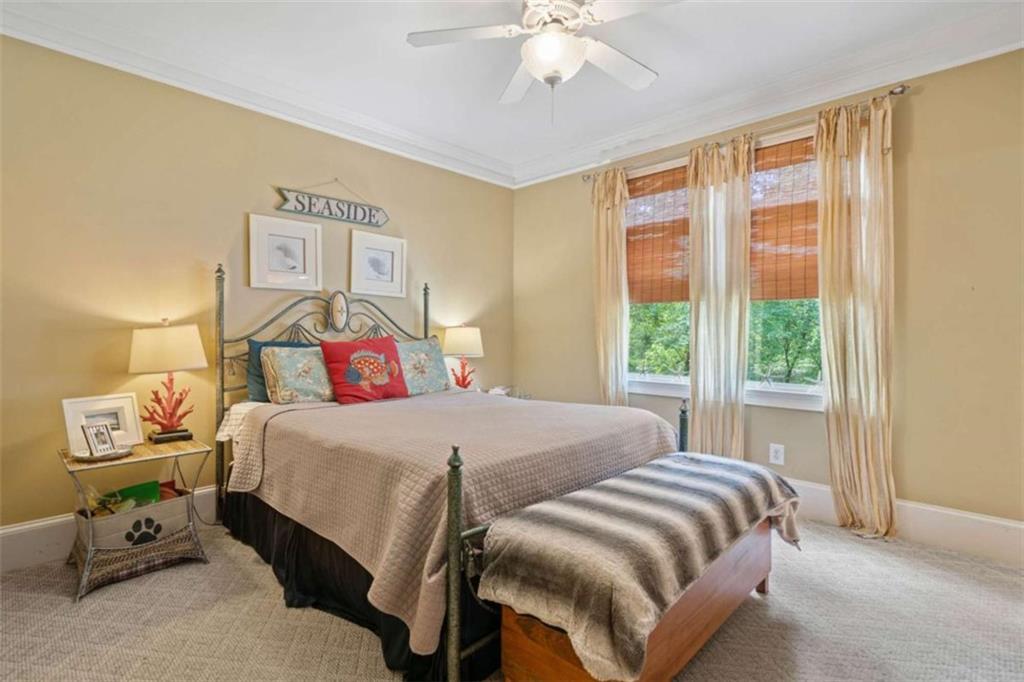 380 Creek Point Milton, GA 30004 - Photo 29 of 74 a bedroom with a bed and wooden floor