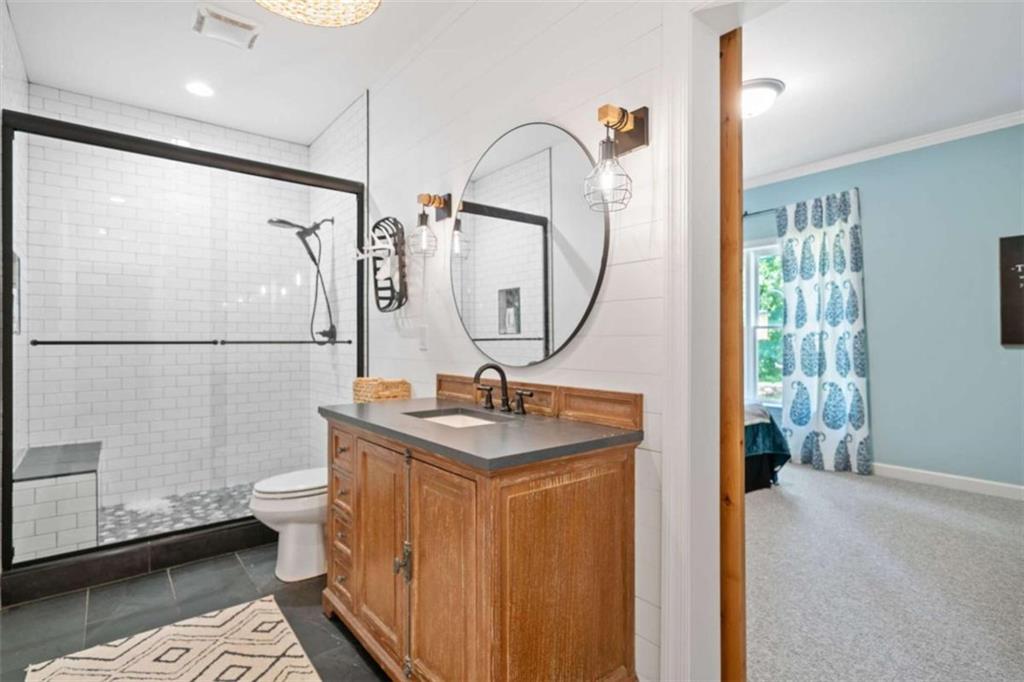 380 Creek Point Milton, GA 30004 - Photo 53 of 74 a bathroom with a sink toilet and shower