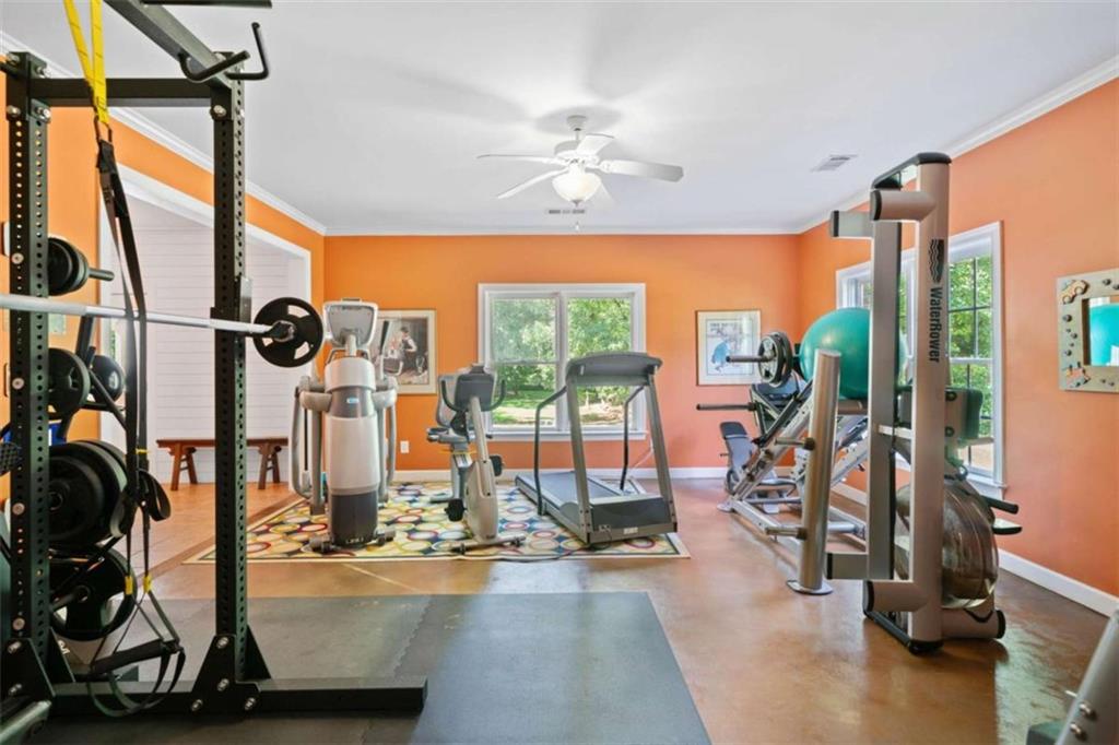 380 Creek Point Milton, GA 30004 - Photo 54 of 74 a view of a room with gym equipment