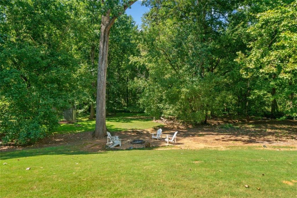 380 Creek Point Milton, GA 30004 - Photo 61 of 74 a view of a park with a bench