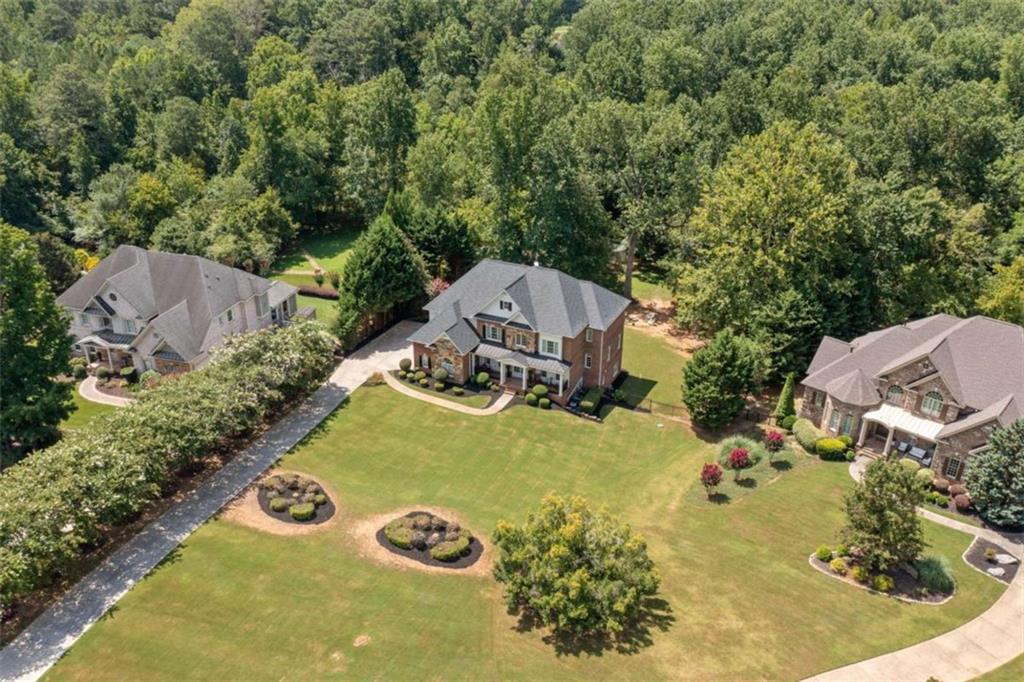 380 Creek Point Milton, GA 30004 - Photo 63 of 74 an aerial view of a house with yard swimming pool and outdoor seating