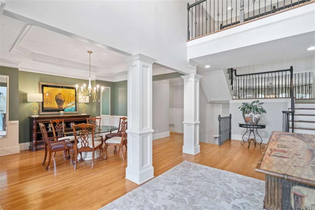 380 Creek Point Milton, GA 30004 - Photo 8 of 74 a view of a a dining room with furniture window and wooden floor