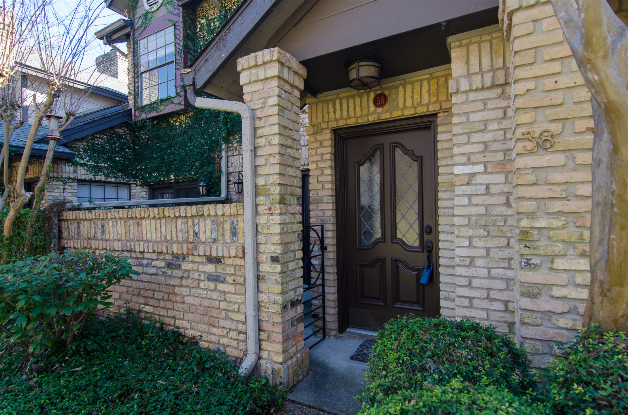 10819 Crown Colony Drive, Unit 38 Austin, TX 78747 - Photo 2 of 28 a view of a door of the house