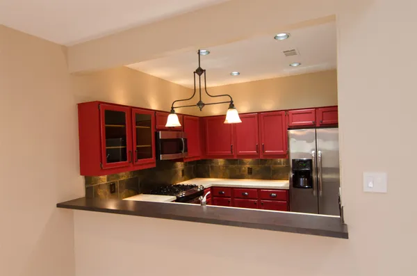 a room with furniture and chandelier