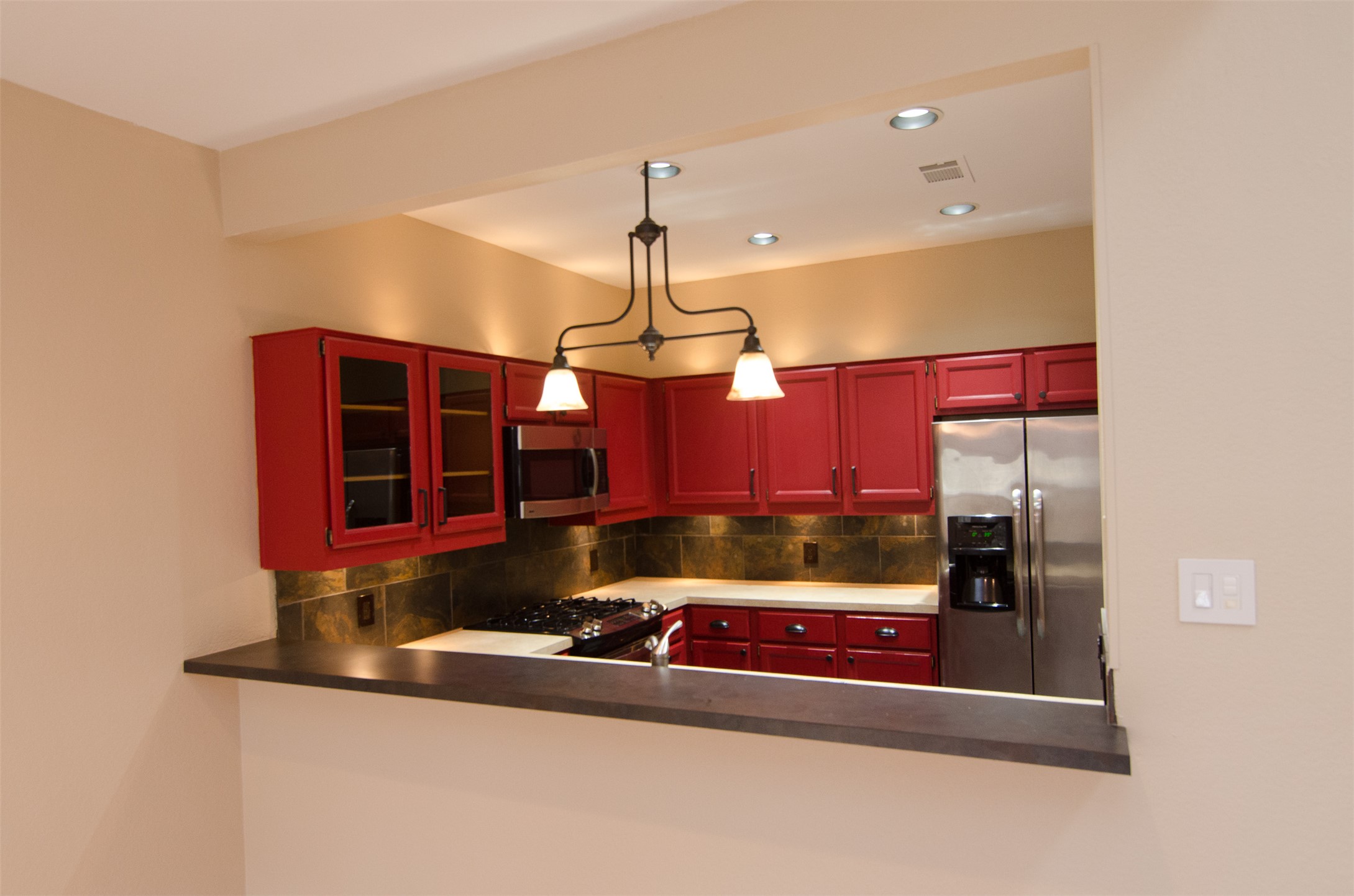 10819 Crown Colony Drive, Unit 38 Austin, TX 78747 - Photo 4 of 28 a room with furniture and chandelier