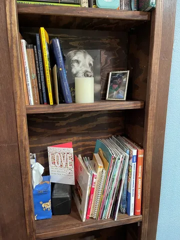 a kitchen with a microwave a stove and cabinets