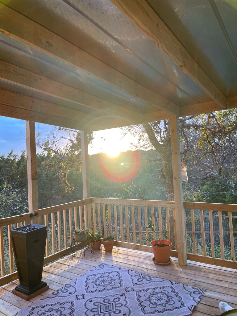 313 Elm Pass II Road East Center Point, TX 78010 - Photo 20 of 37 a view of a two chairs in the balcony