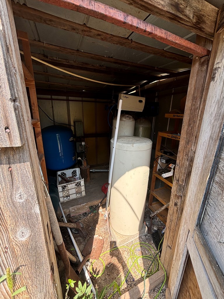313 Elm Pass II Road East Center Point, TX 78010 - Photo 21 of 37 a view of storage and utility room