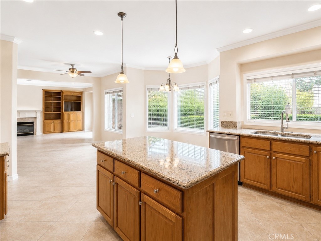 2811 North Roxbury Street Orange, CA 92867 - Photo 8 of 22 a kitchen with granite countertop a sink and center island