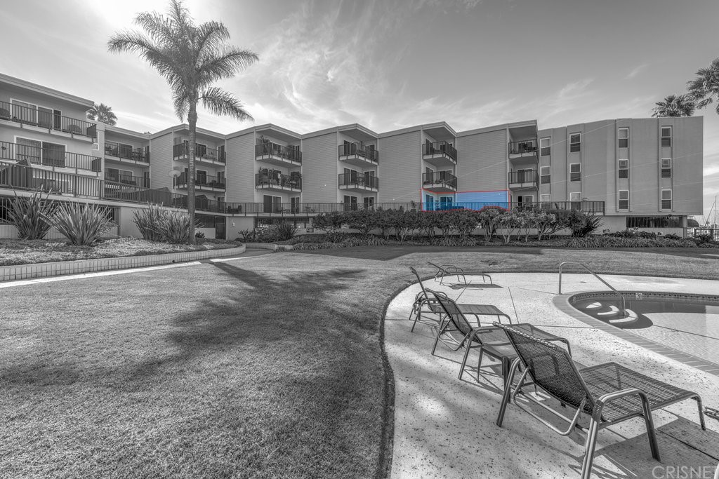3101 Peninsula Road, Unit 108 Oxnard, CA 93035 - Photo 12 of 24 a view of a chairs and table in the patio