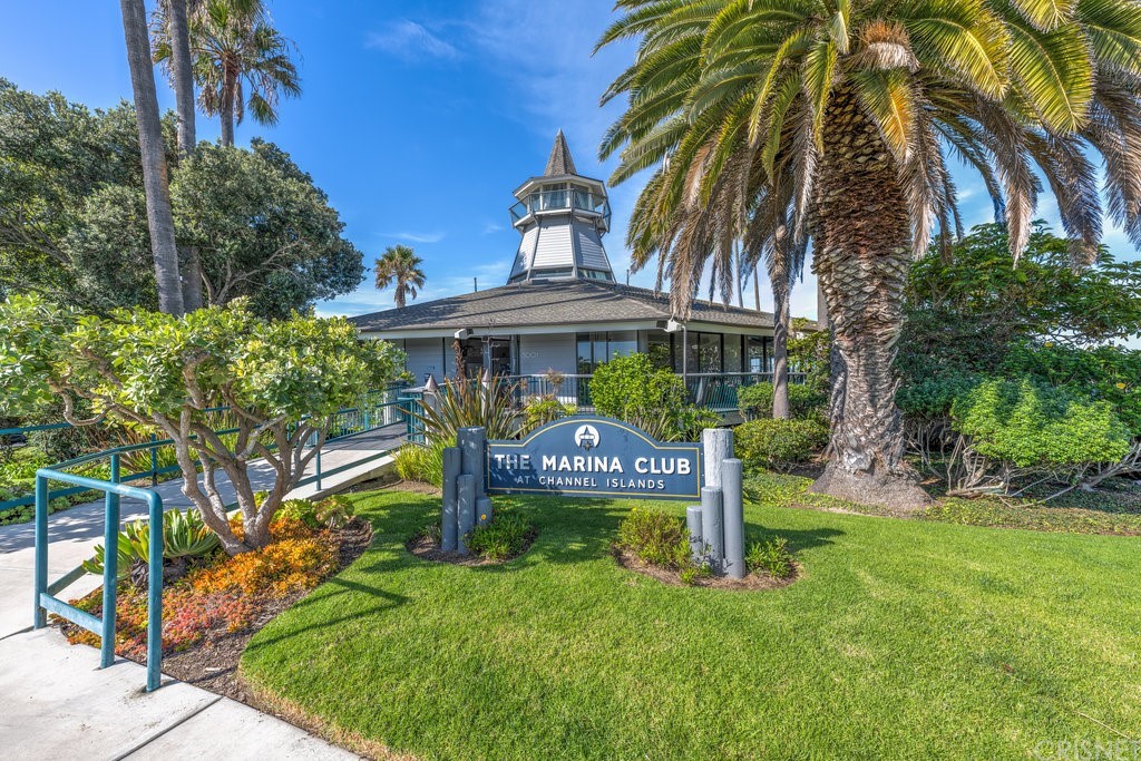 3101 Peninsula Road, Unit 108 Oxnard, CA 93035 - Photo 16 of 24 a front view of a house with garden