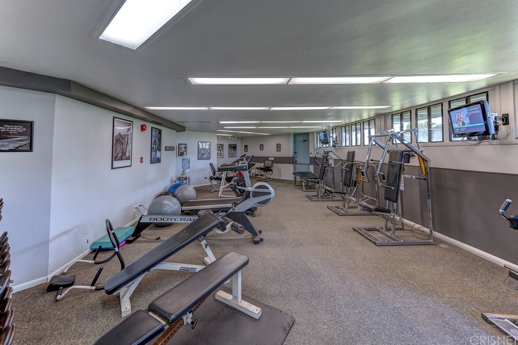 3101 Peninsula Road, Unit 108 Oxnard, CA 93035 - Photo 17 of 24 a view of a room with gym equipment