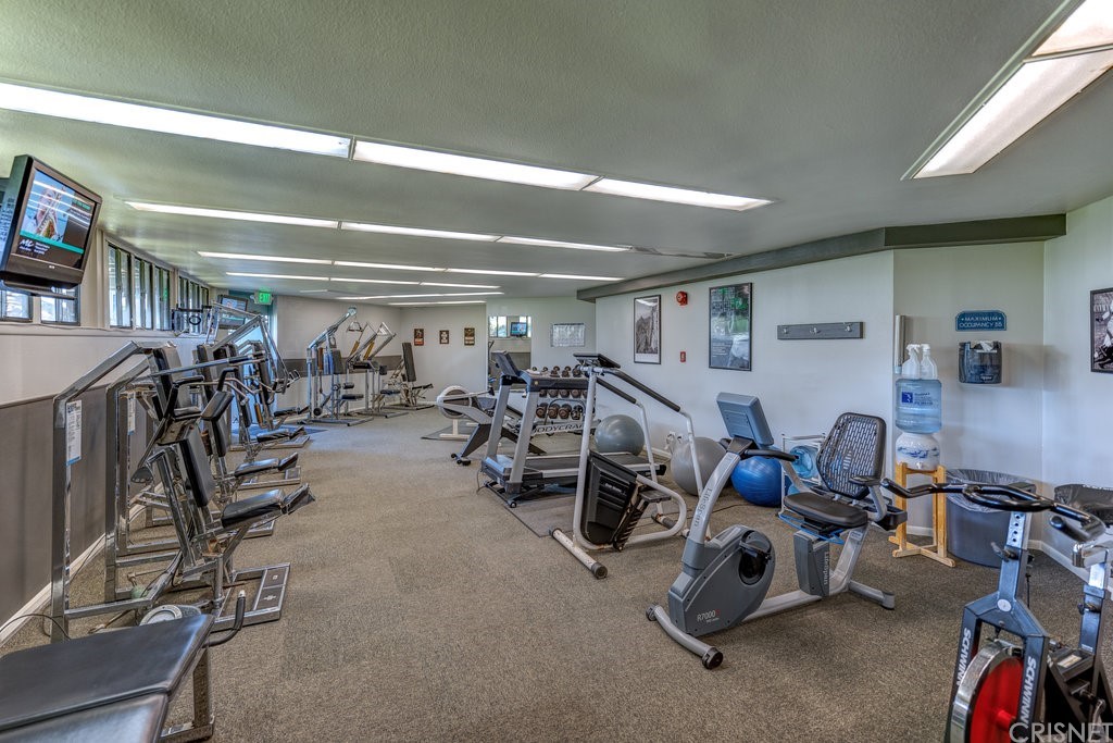 3101 Peninsula Road, Unit 108 Oxnard, CA 93035 - Photo 18 of 24 a view of a room with gym equipment