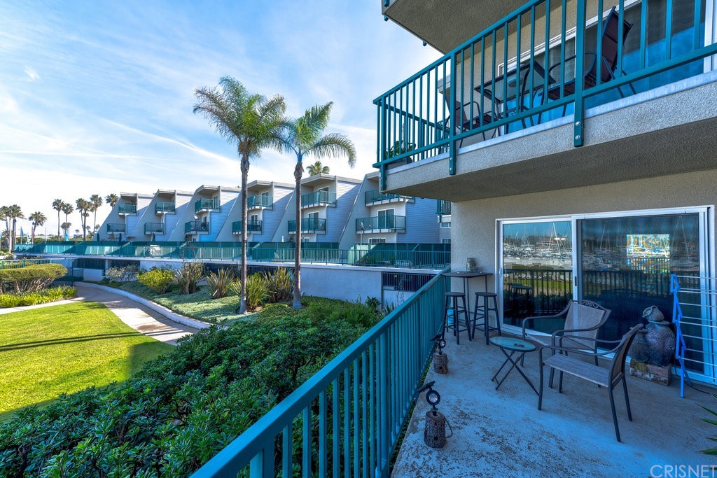 3101 Peninsula Road, Unit 108 Oxnard, CA 93035 - Photo 3 of 24 a view of a balcony with chairs