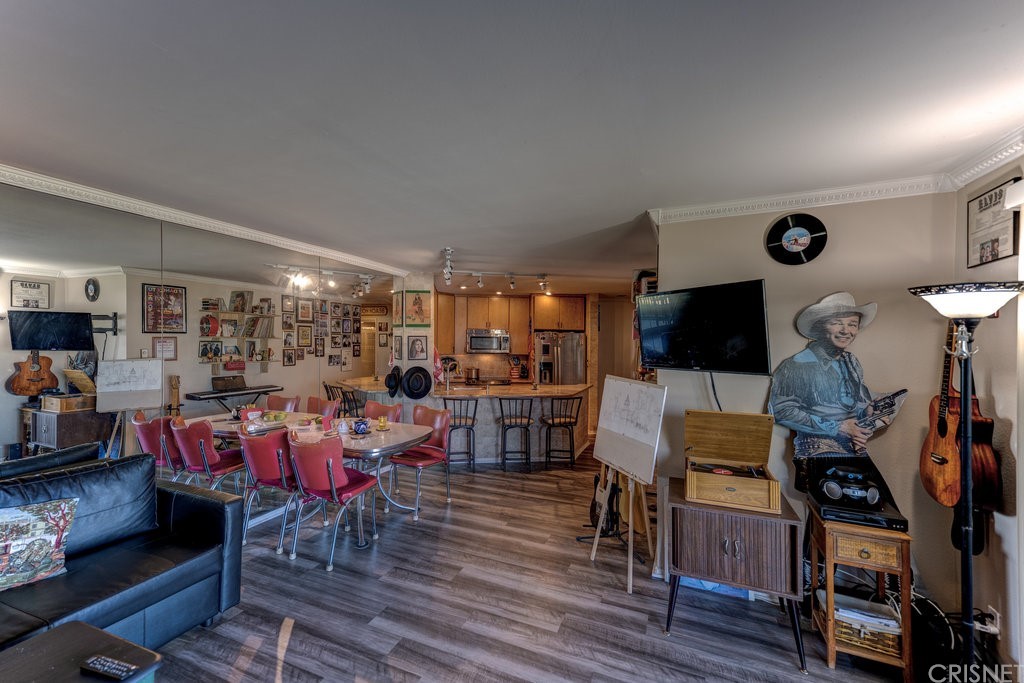 3101 Peninsula Road, Unit 108 Oxnard, CA 93035 - Photo 7 of 24 a view of a living room or kitchen and dining room