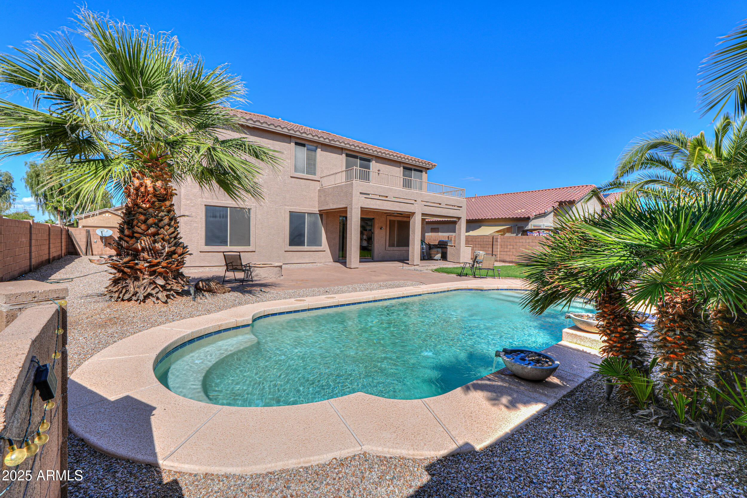 43223 West Venture Road Maricopa, AZ 85138 - Photo 1 of 70 a house view with a garden space