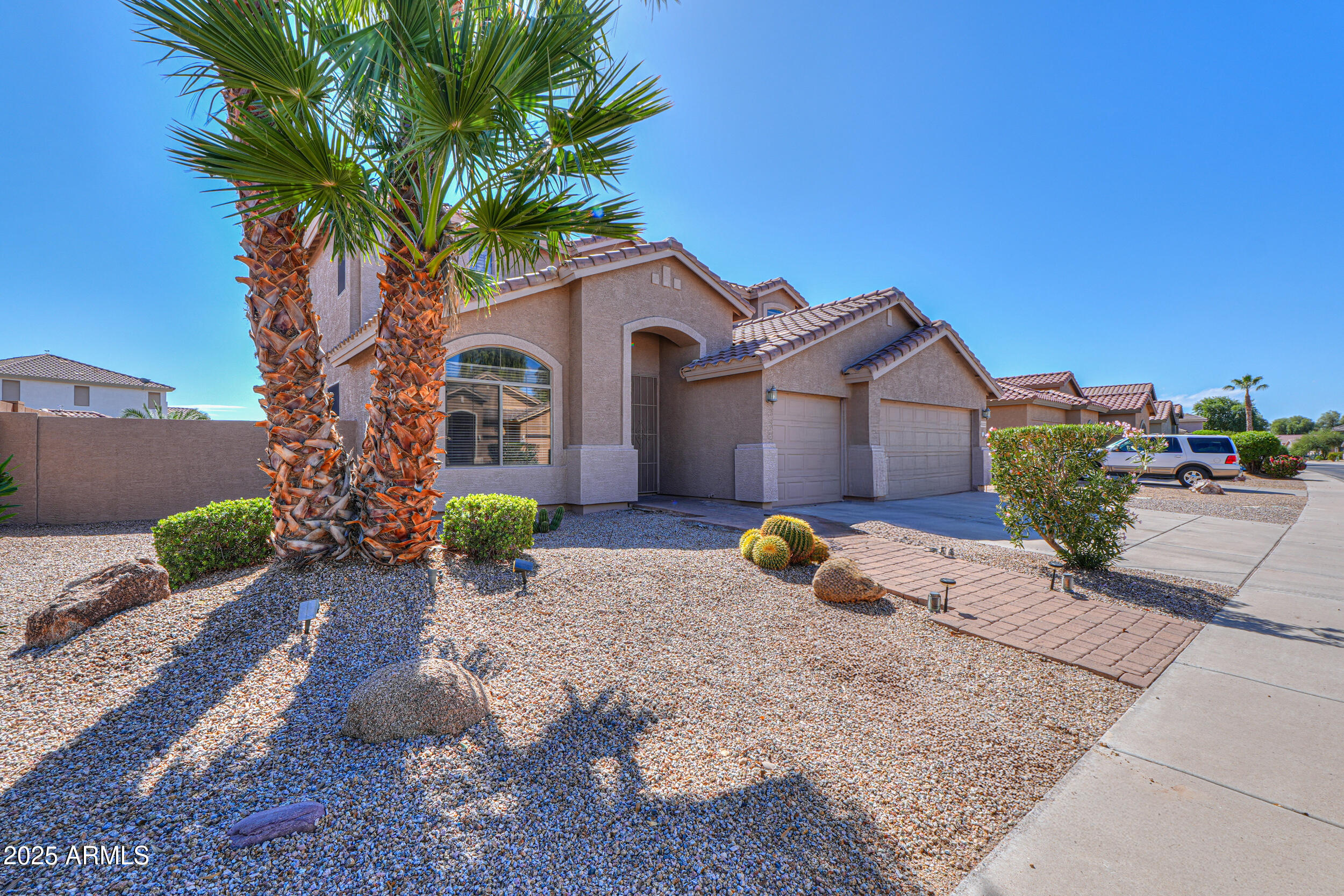 43223 West Venture Road Maricopa, AZ 85138 - Photo 16 of 70 a large tree in front of a house