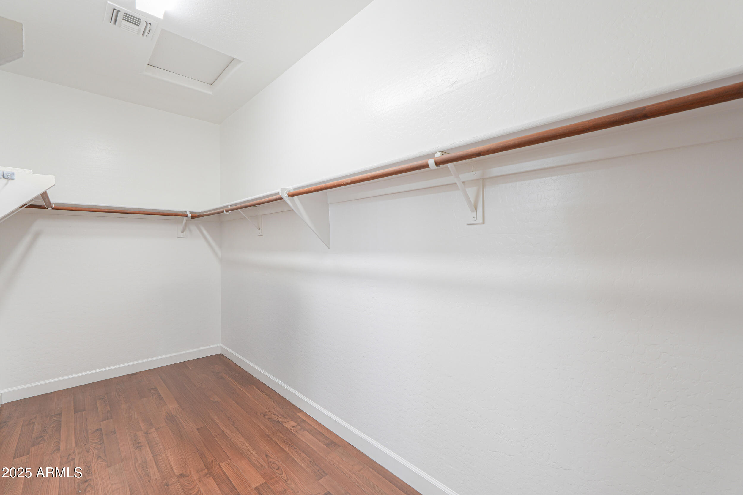 43223 West Venture Road Maricopa, AZ 85138 - Photo 58 of 70 a view of a room with racks on the wall