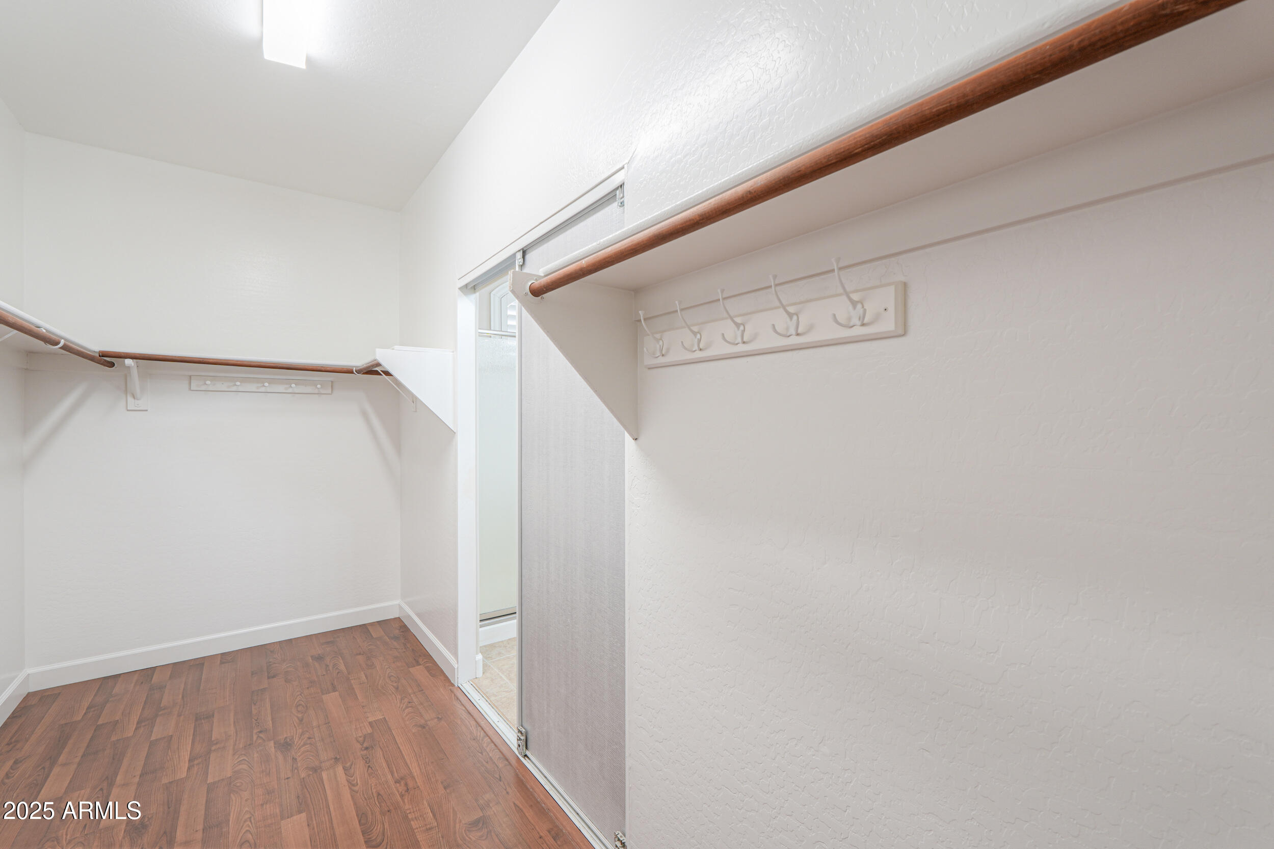 43223 West Venture Road Maricopa, AZ 85138 - Photo 59 of 70 a view of a hallway with staircase