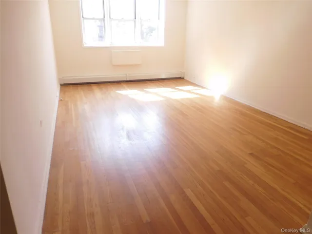 a view of backyard with wooden floor