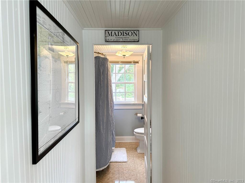 15 Tuxis Road Madison, CT 06443 - Photo 13 of 27 a bathroom with a shower