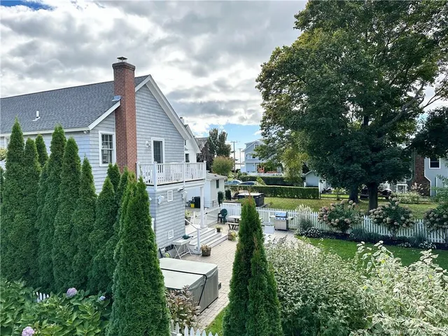 a backyard of a house with lots of green space