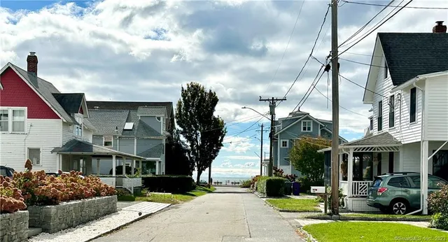 a front view of a building with garden