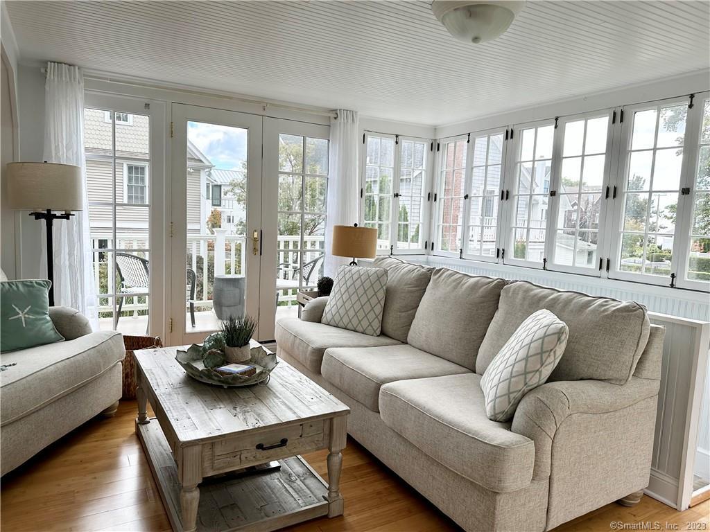 15 Tuxis Road Madison, CT 06443 - Photo 3 of 27 a living room with furniture and a large window