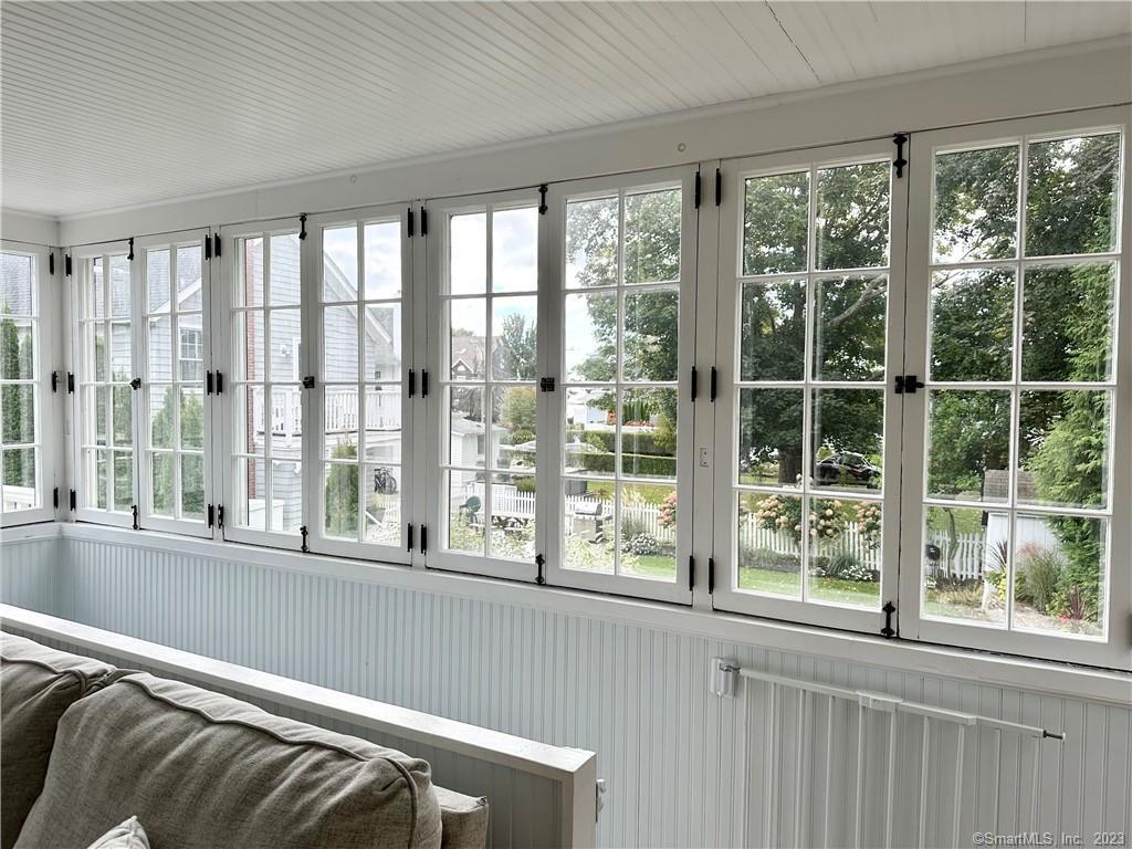 15 Tuxis Road Madison, CT 06443 - Photo 4 of 27 a view of a balcony with wooden floor