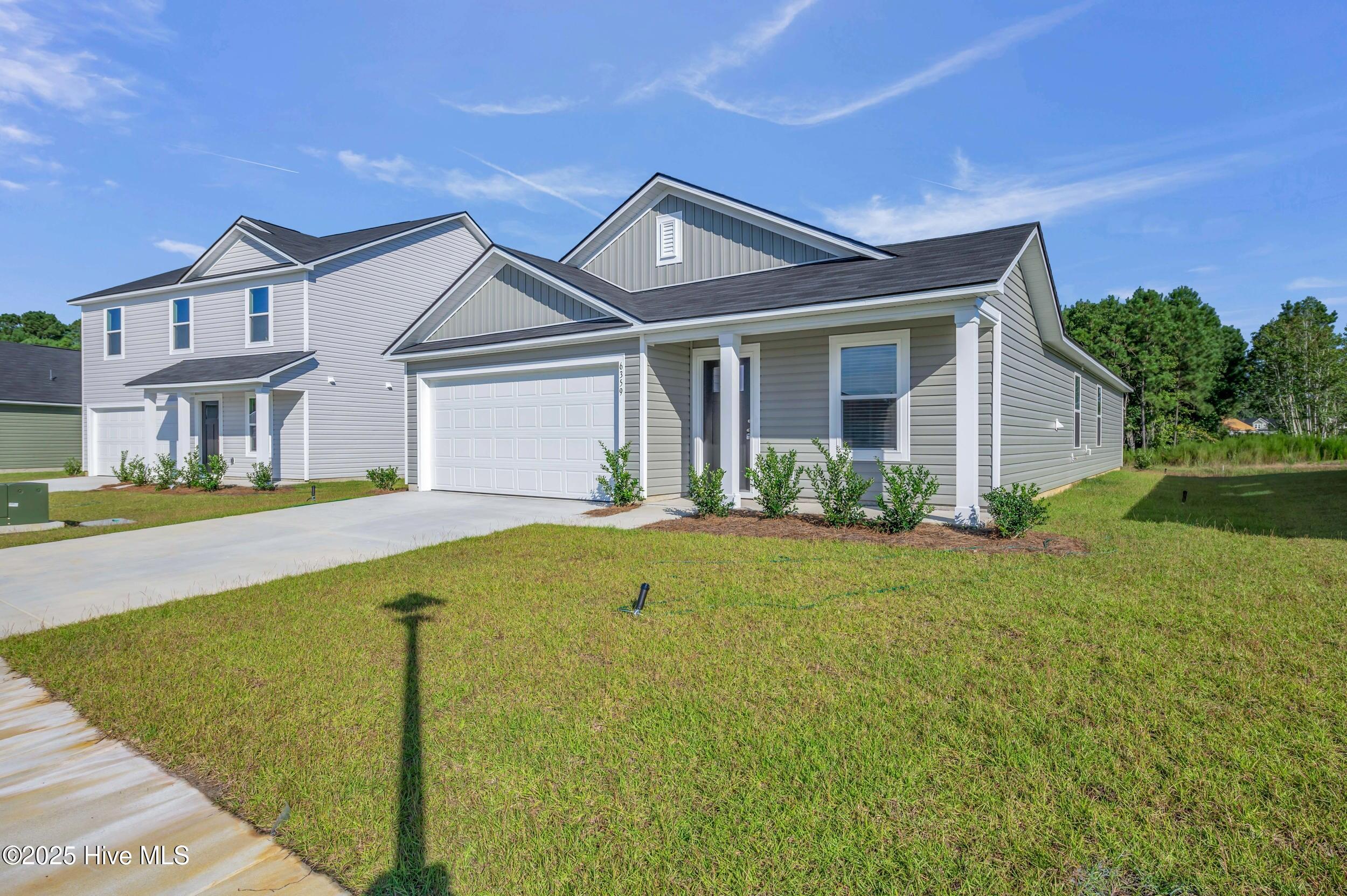 6359 Swainson Street Southwest Ocean Isle Beach, NC 28469 - Photo 1 of 31 Front of house