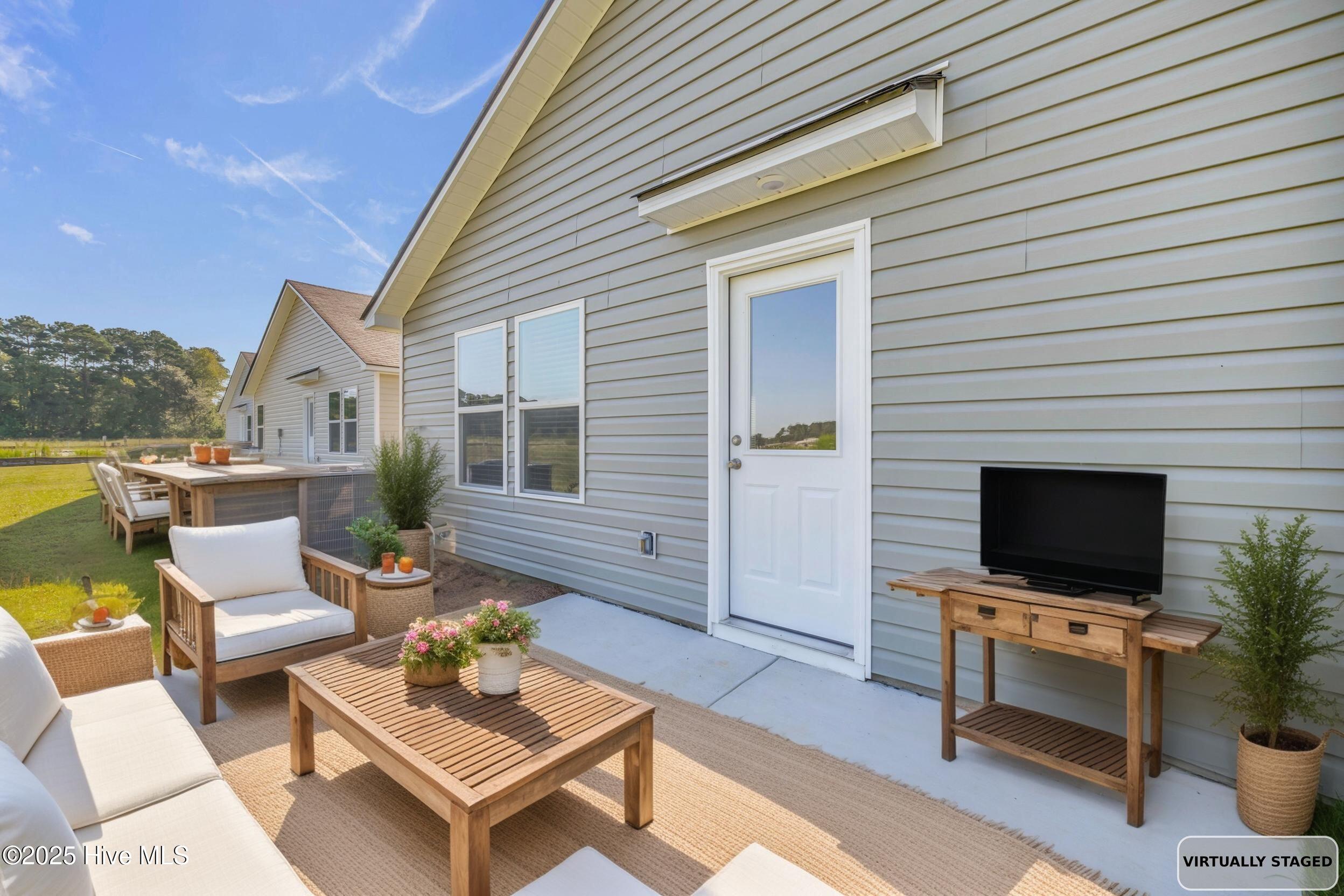 6359 Swainson Street Southwest Ocean Isle Beach, NC 28469 - Photo 12 of 31 Virtual back patio