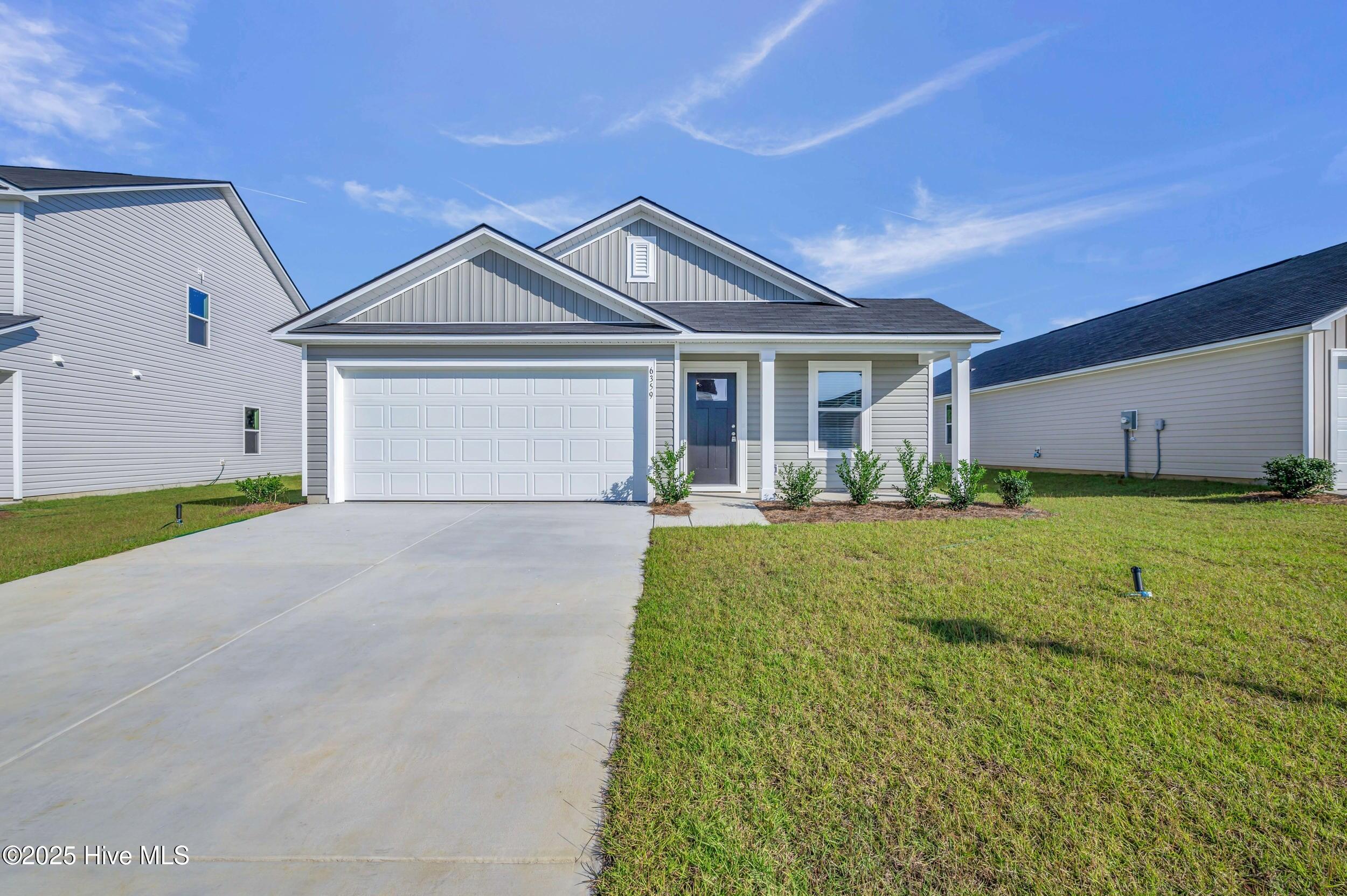 6359 Swainson Street Southwest Ocean Isle Beach, NC 28469 - Photo 14 of 31 Front of house 2