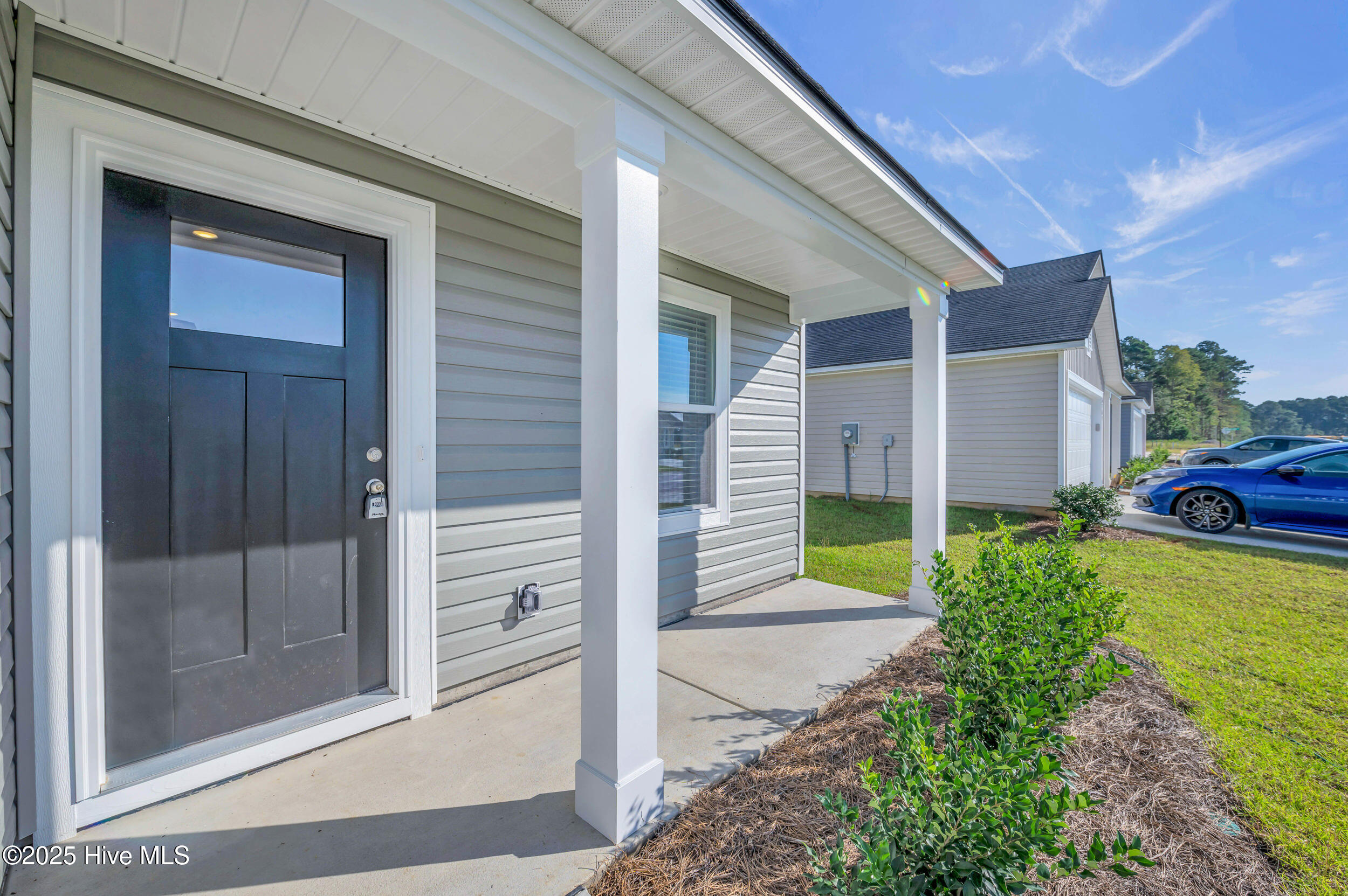 6359 Swainson Street Southwest Ocean Isle Beach, NC 28469 - Photo 15 of 31 Front porch