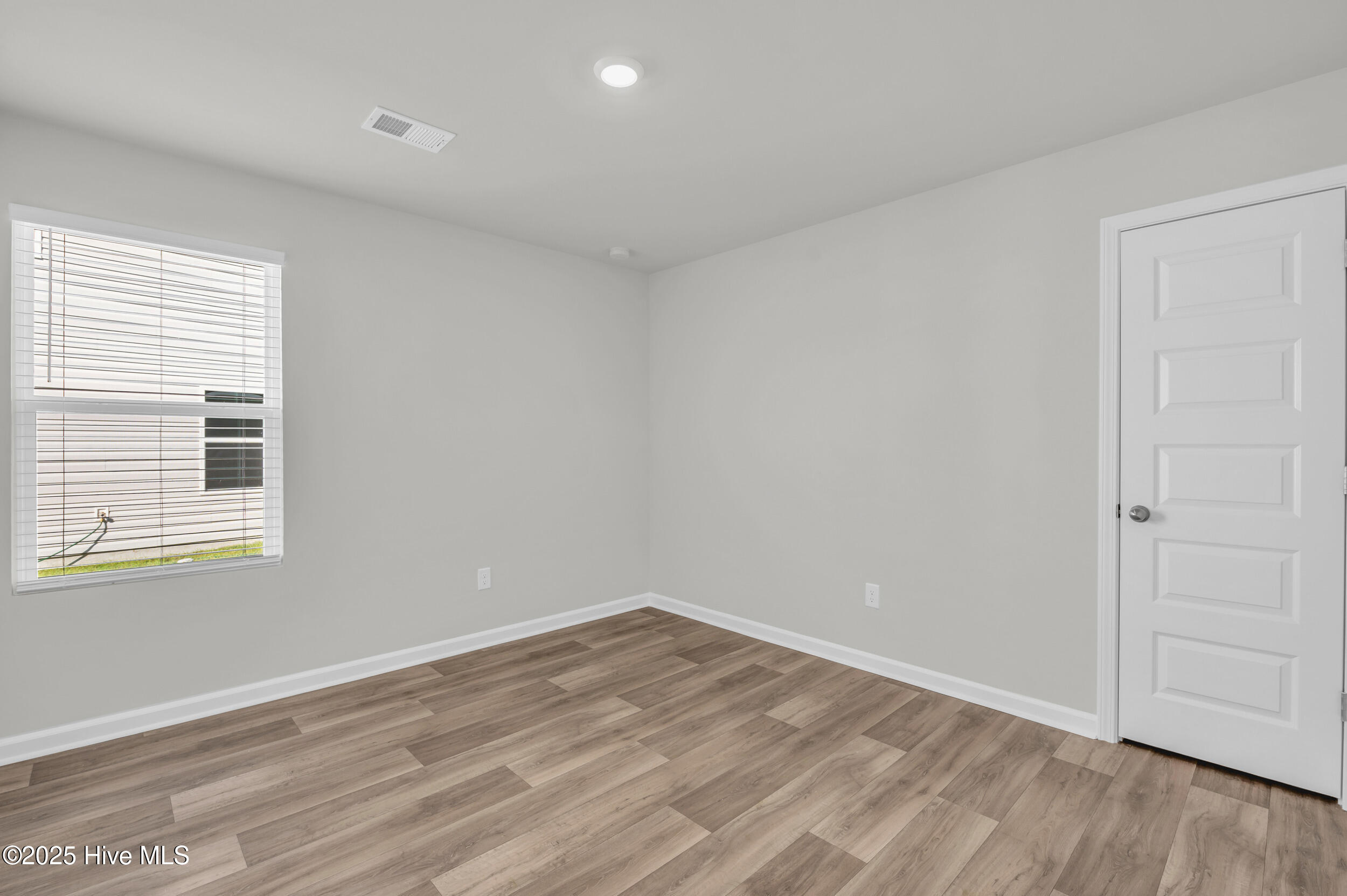 6359 Swainson Street Southwest Ocean Isle Beach, NC 28469 - Photo 20 of 31 Guest bedroom